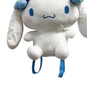 Adorable White Plush Toy with Blue Accents